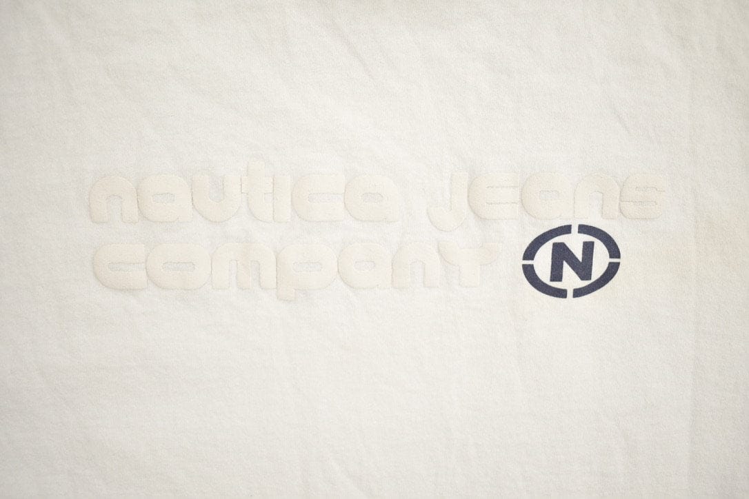 Vintage 1990s Nautica Jean Company Graphic T-Shirt Men's 2XL from propervintagecanada