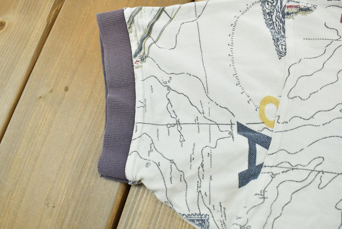 Vintage 1990s Nautica Map Print Polo Shirt Men's M from propervintagecanada