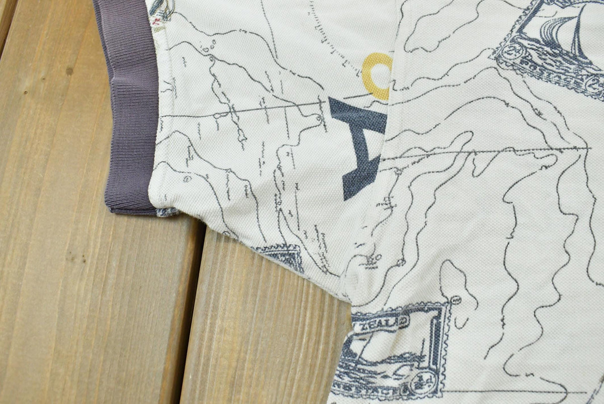 Vintage 1990s Nautica Map Print Polo Shirt Men's M from propervintagecanada