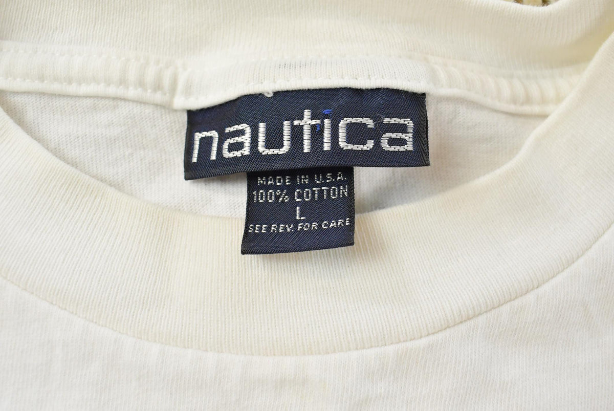 Vintage 1990s Nautica Rowing Oars Graphic T Shirt Men's L from propervintagecanada