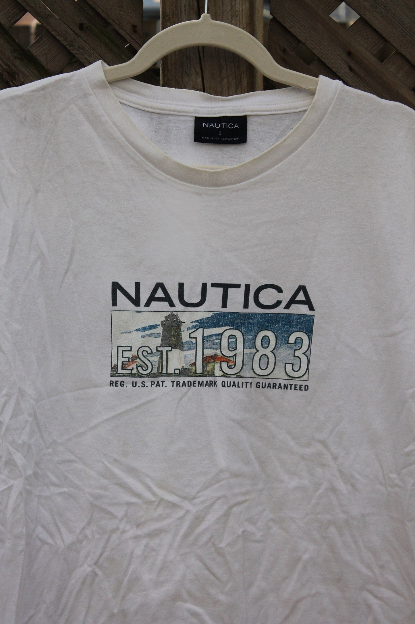 Vintage 1990s Nautica Sailing Graphic T Shirt from propervintagecanada