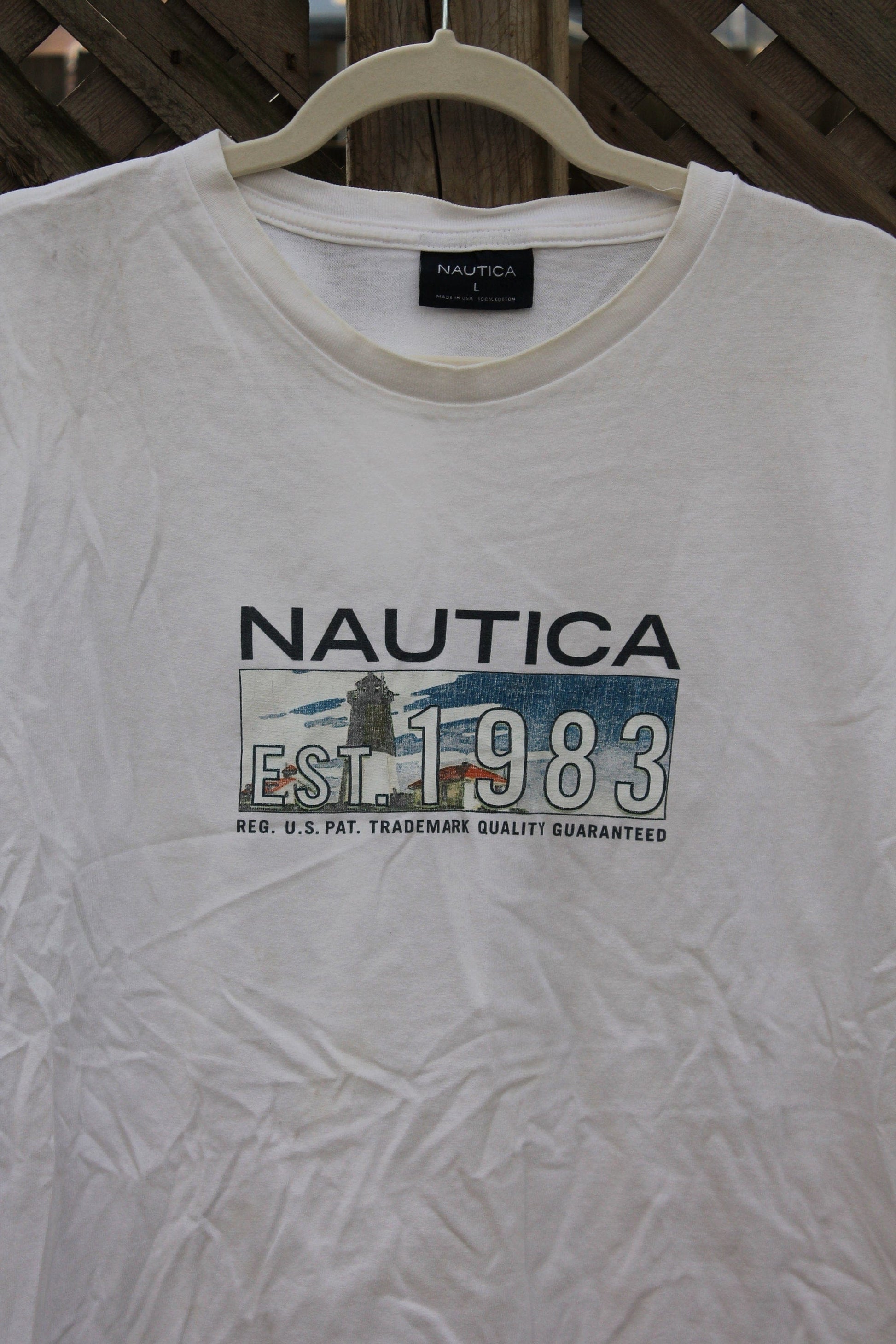 Vintage 1990s Nautica Sailing Graphic T Shirt from propervintagecanada