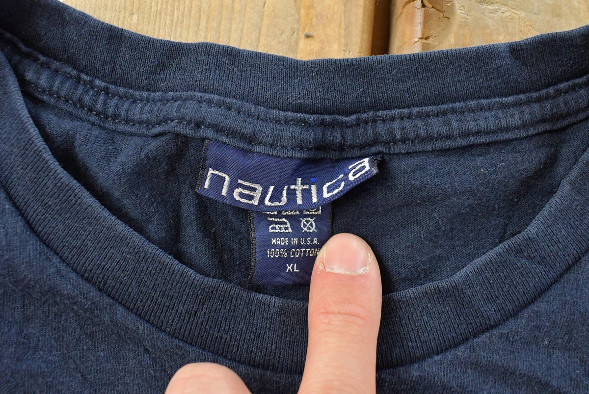 Vintage 1990s Nautica Spellout Graphic T Shirt Men's XL from propervintagecanada
