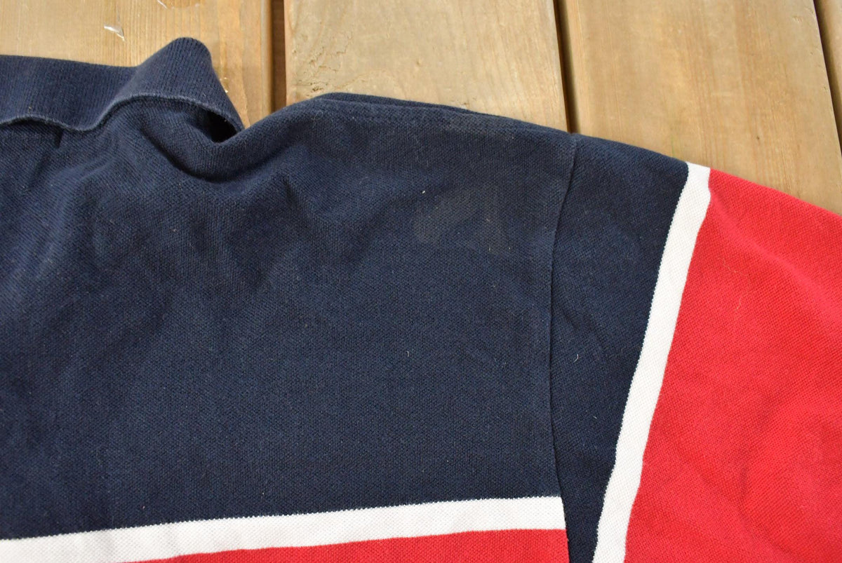 Vintage 1990s Nautica Striped Polo Shirt Men's Large from propervintagecanada