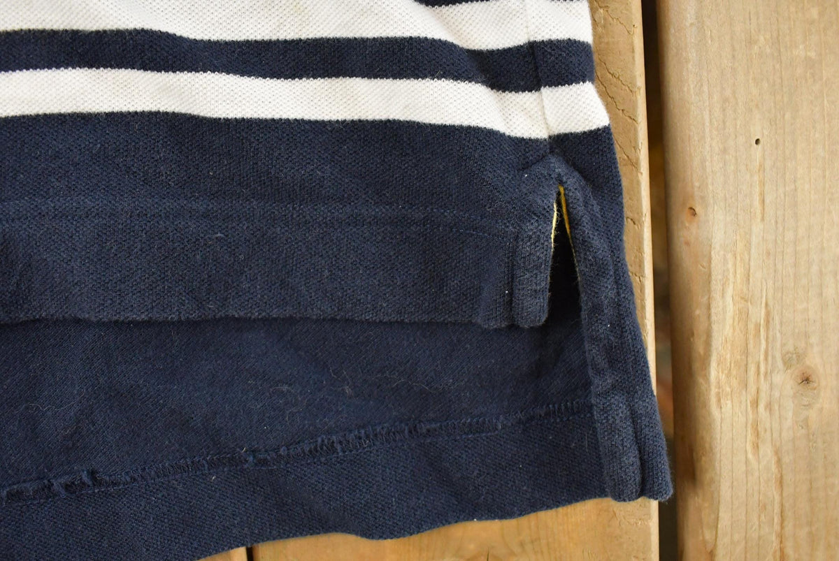 Vintage 1990s Nautica Striped Polo Shirt Men's Large from propervintagecanada