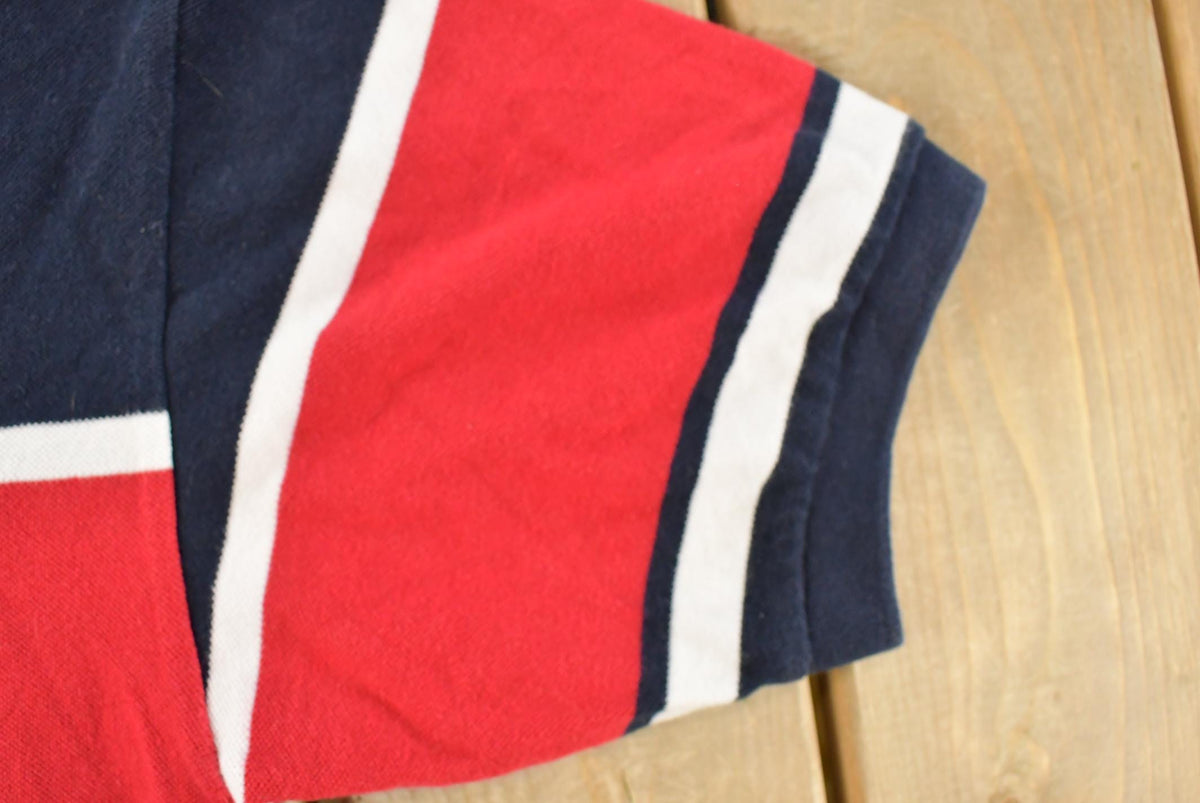 Vintage 1990s Nautica Striped Polo Shirt Men's Large from propervintagecanada