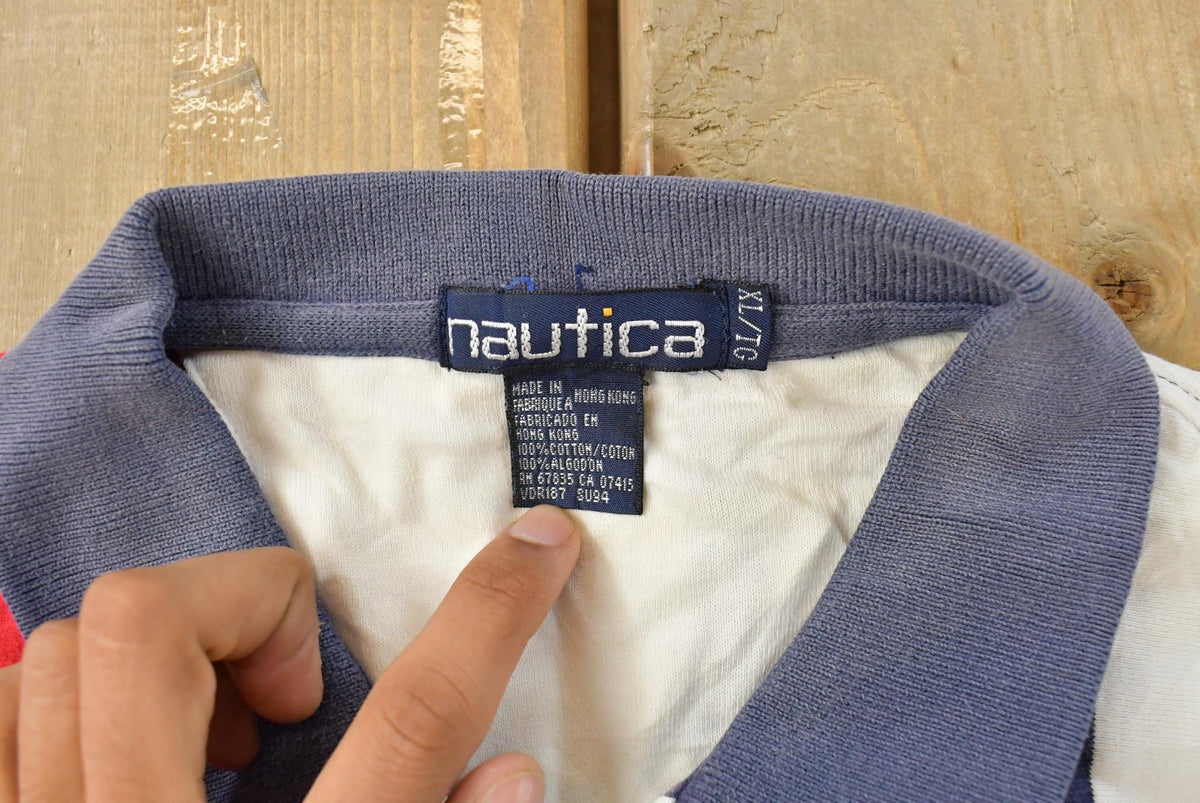 Vintage 1990s Nautica Striped Polo Shirt Men's XL from propervintagecanada