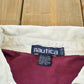 Vintage 1990s Nautica Striped Rugby Long Sleeve Polo Shirt Men's XL from propervintagecanada