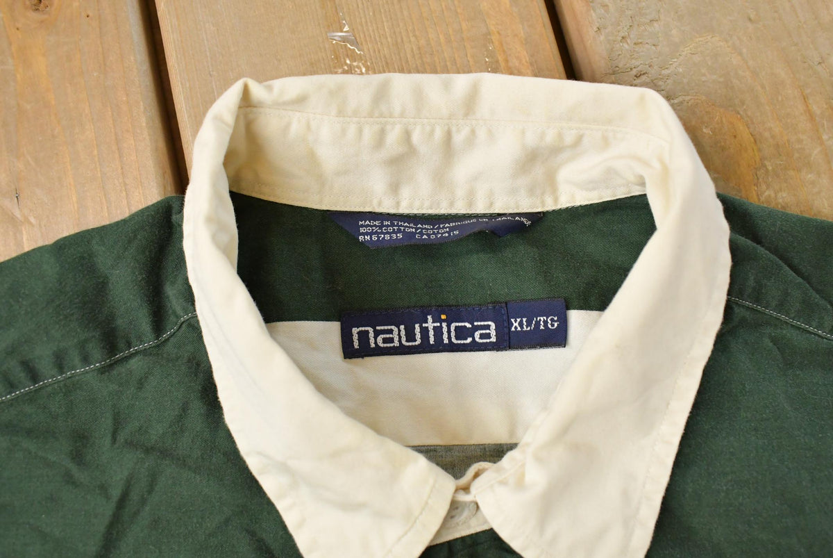 Vintage 1990s Nautica Striped Rugby Long Sleeve Polo Shirt Men's XL from propervintagecanada