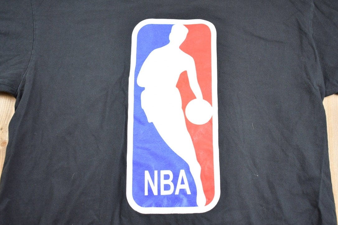 Vintage 1990s NBA Logo Graphic T-Shirt Men's XL from propervintagecanada