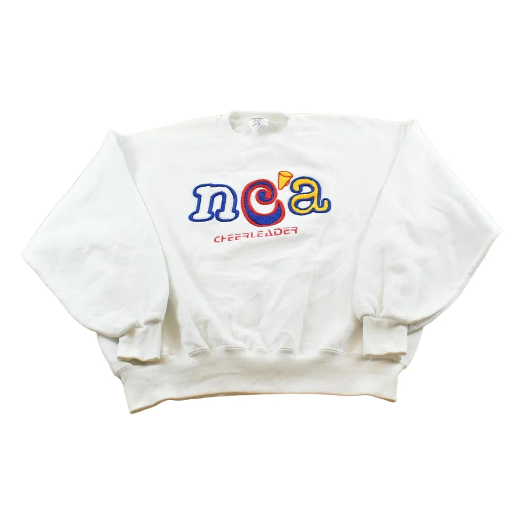 Vintage 1990s NCA Cheerleader Chenille Patch Embroidered Crewneck Sweatshirt Men's L / Made In USA / 90s Streetwear from propervintagecanada