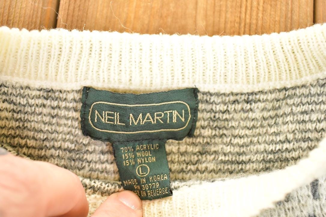 Vintage 1990s Neil Martin AOP Snowflake Design Knit Crewneck Sweater Mens L from propervintagecanada