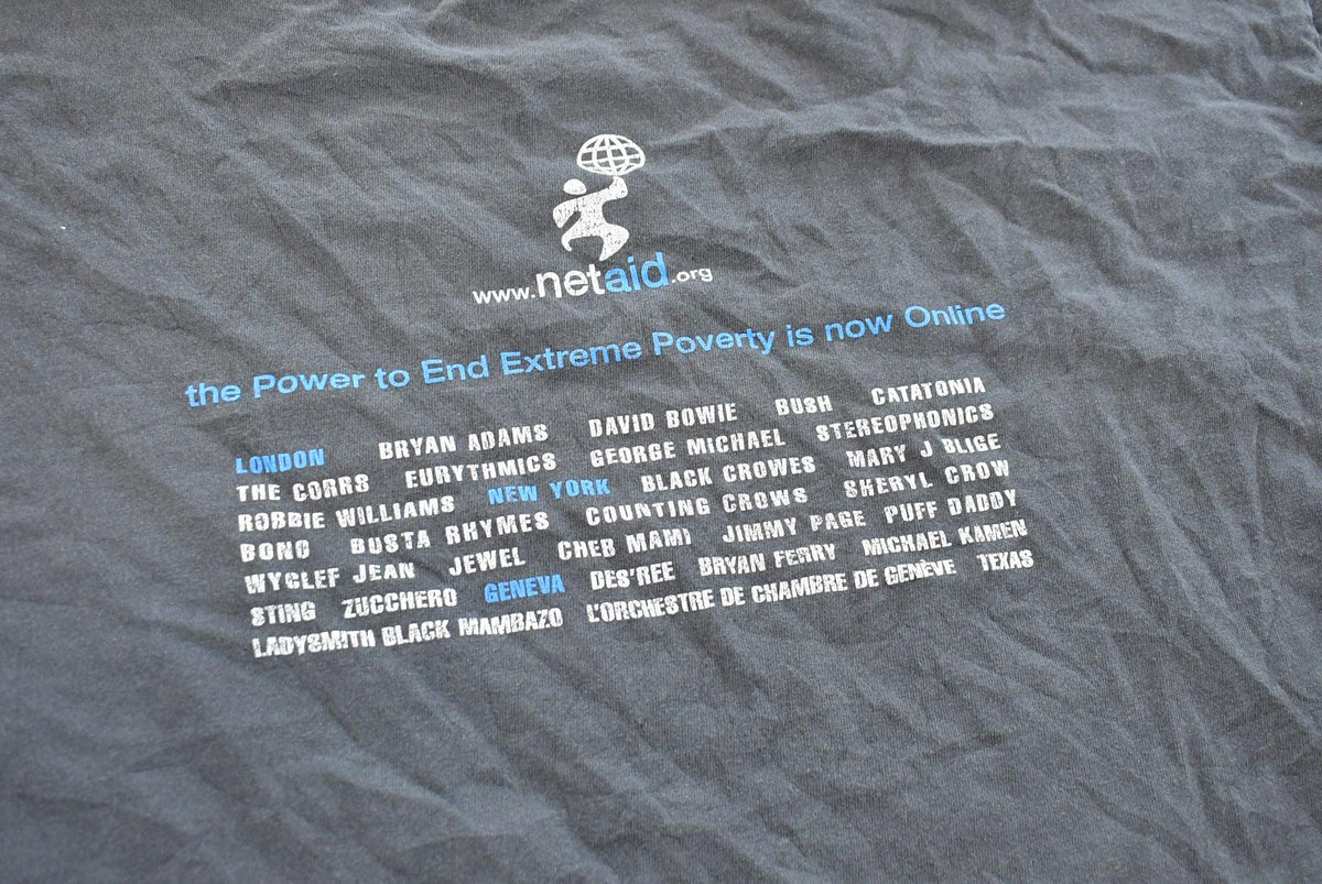 Vintage 1990s Netaid.org Charity Concert T-Shirt Mens XL from propervintagecanada
