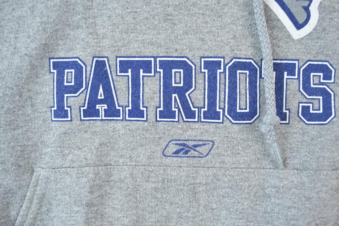 Vintage 1990s New England Patriots Reebok NFL Hoodie Sweatshirt / Made In USA / Football / Sportswear / Americana from propervintagecanada