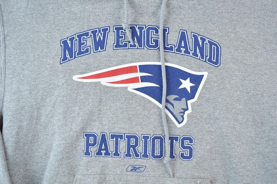Vintage 1990s New England Patriots Reebok NFL Hoodie Sweatshirt / Made In USA / Football / Sportswear / Americana from propervintagecanada