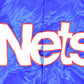 Vintage 1990s New Jersey Nets Hardwood Classics Satin Button Down Puffer Bomber Style NBA Basketball Jacket from propervintagecanada