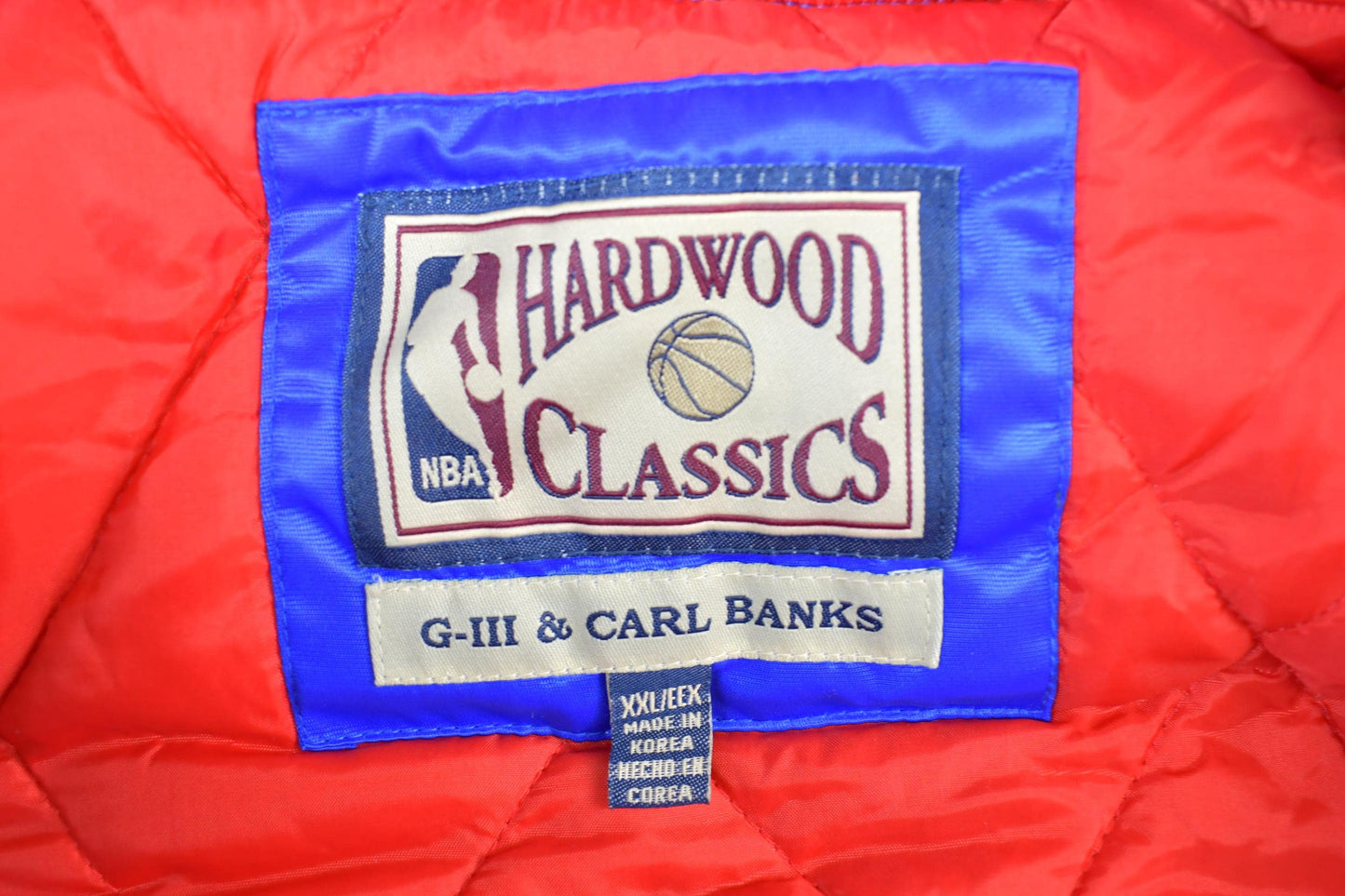 Vintage 1990s New Jersey Nets Hardwood Classics Satin Button Down Puffer Bomber Style NBA Basketball Jacket from propervintagecanada