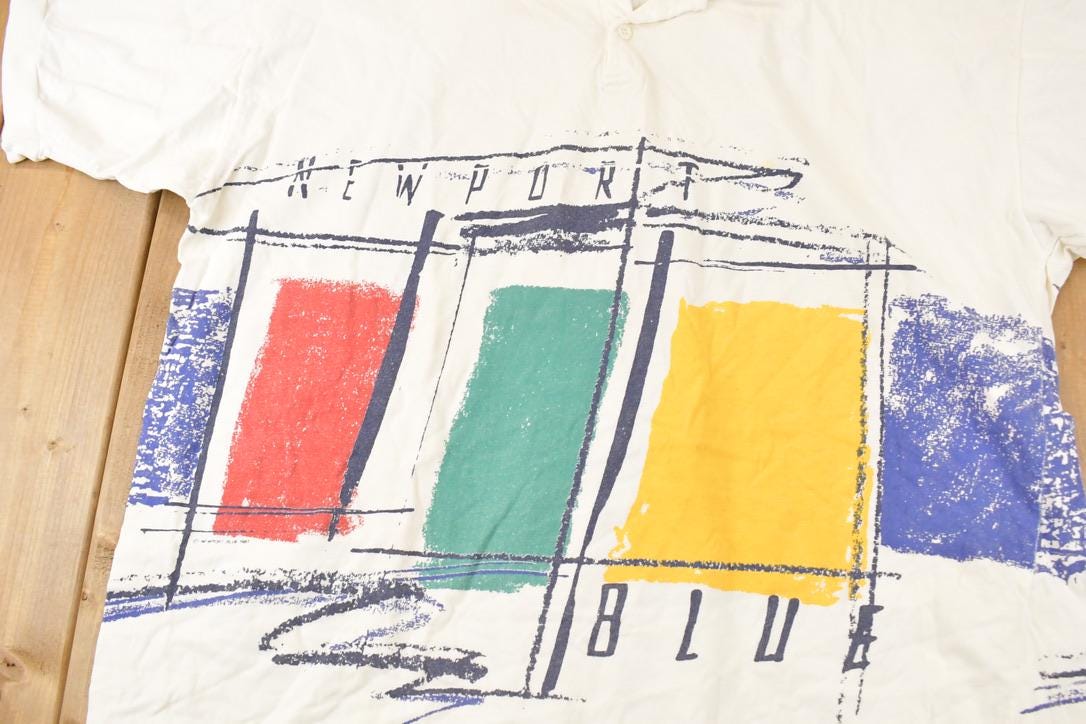 Vintage 1990s New Port Blue Quarter Button FAB Abstract Shirt Men's XL from propervintagecanada