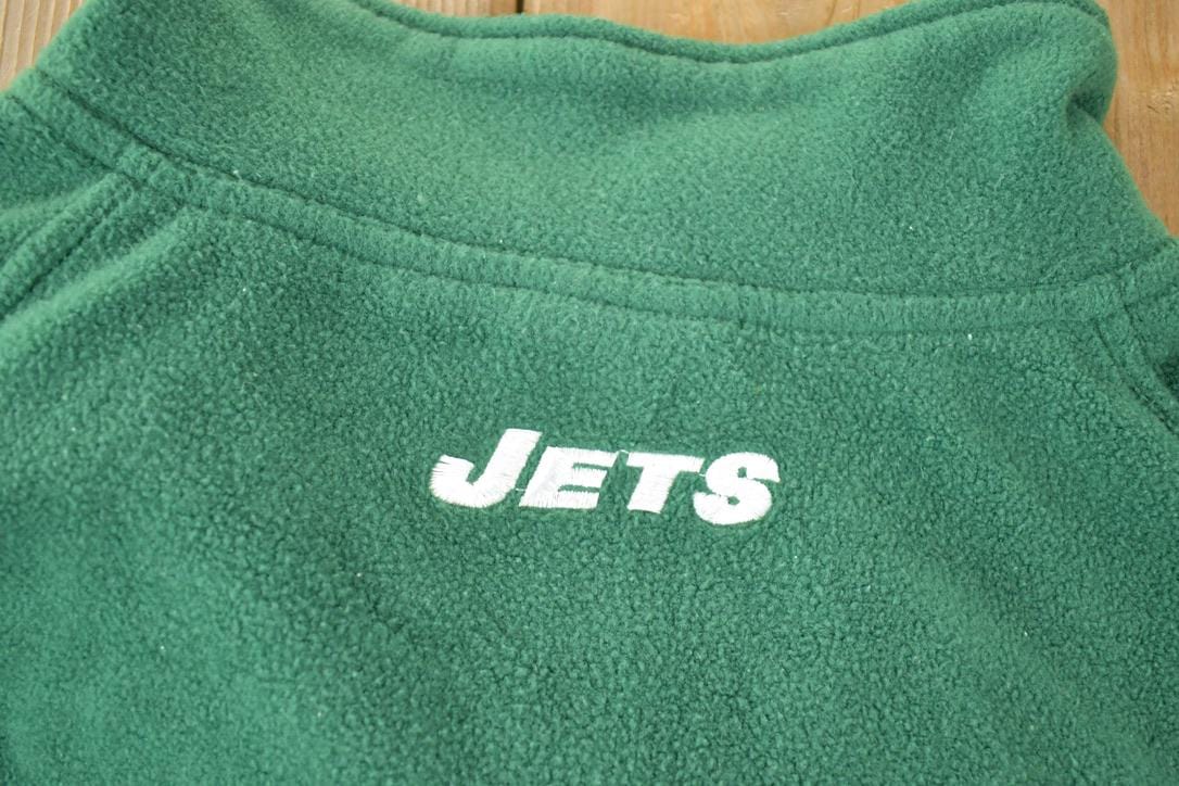 Vintage 1990s New York Jets Fleece NFL Outdoorsman Sweater Men's Large from propervintagecanada