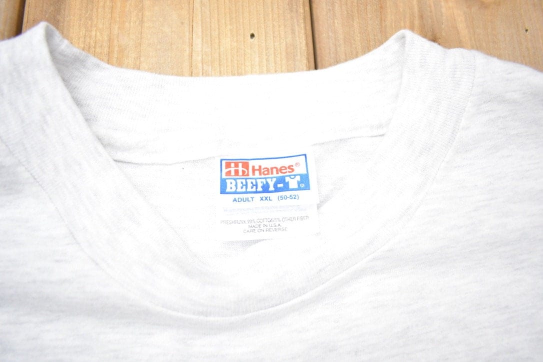 Vintage 1990s NFL Hanes Player Programs Graphic T-Shirt Men's 2XL from propervintagecanada