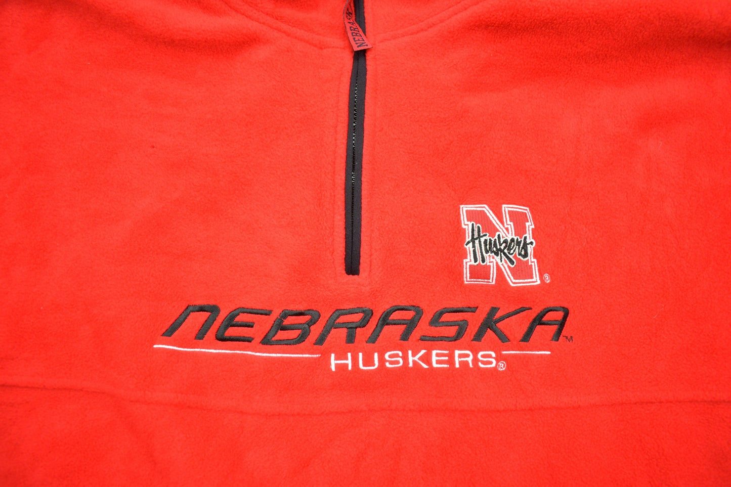 Vintage 1990s NFL Nebraska Huskers Fleece Quarter Zip Up Sweatshirt Men's 2XL from propervintagecanada