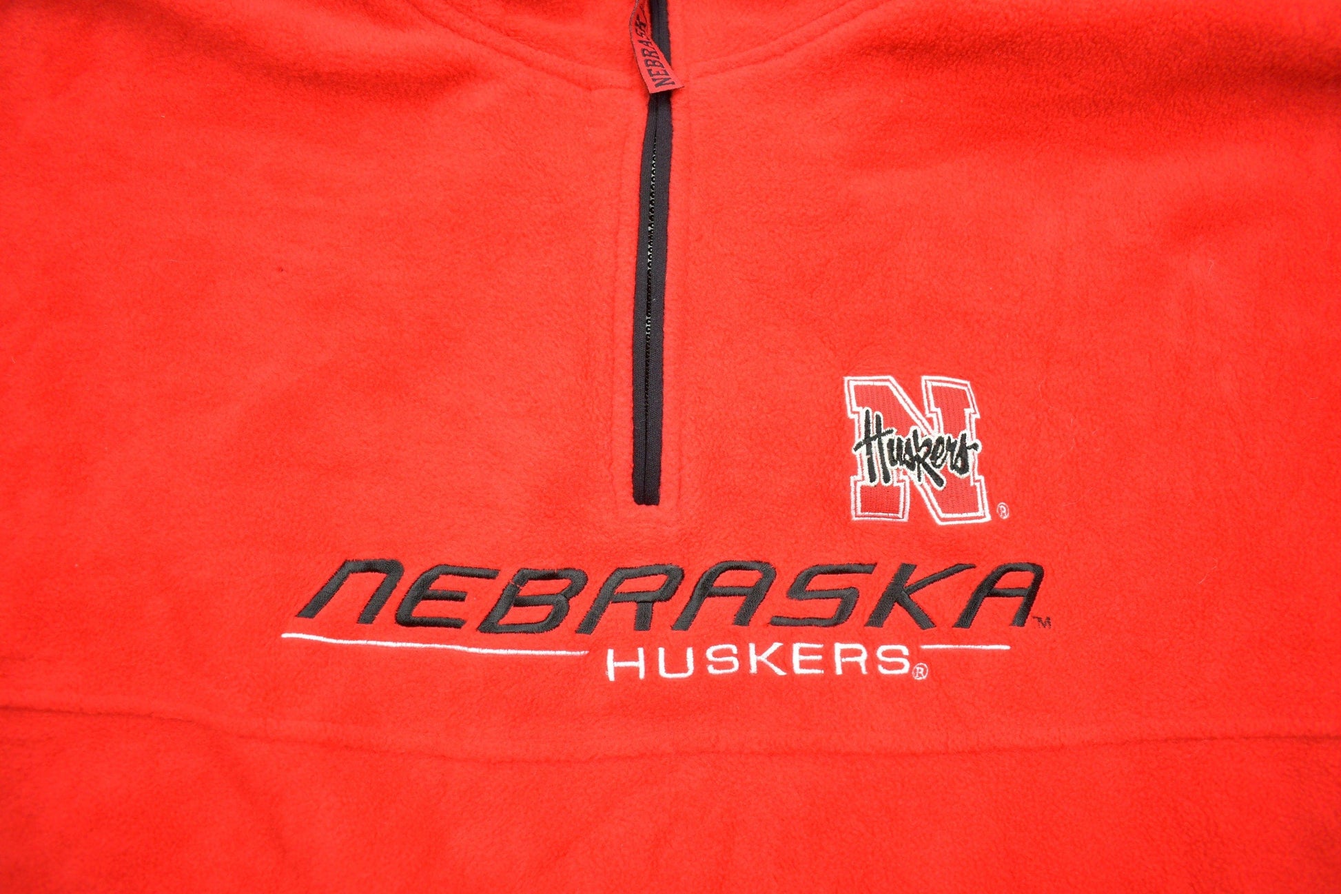Vintage 1990s NFL Nebraska Huskers Fleece Quarter Zip Up Sweatshirt Men's 2XL from propervintagecanada