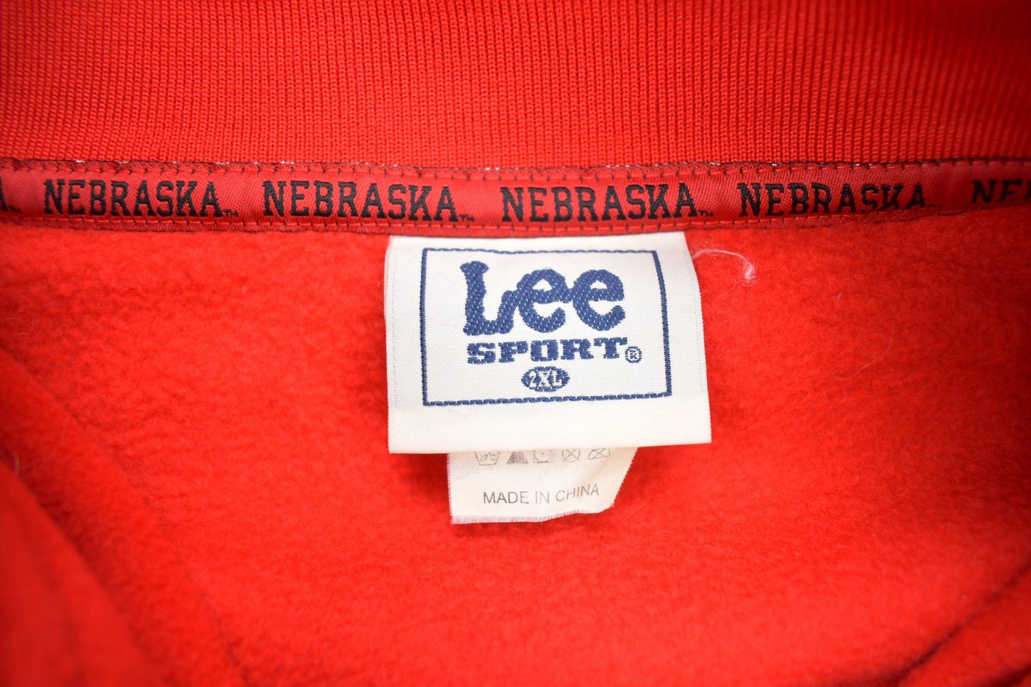 Vintage 1990s NFL Nebraska Huskers Fleece Quarter Zip Up Sweatshirt Men's 2XL from propervintagecanada