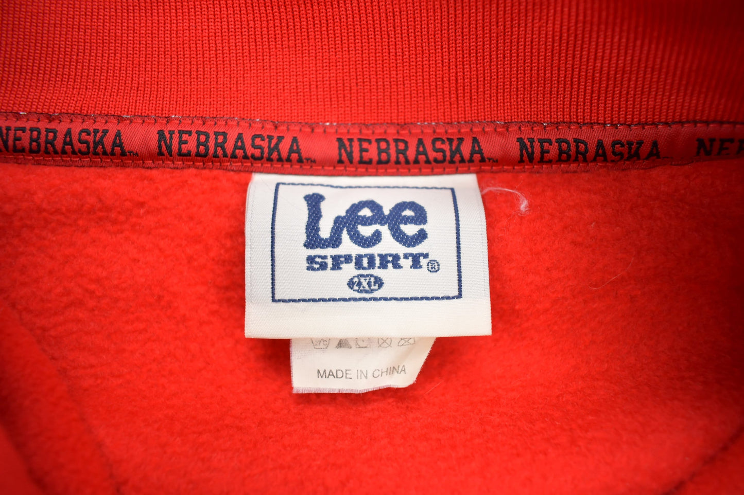 Vintage 1990s NFL Nebraska Huskers Fleece Quarter Zip Up Sweatshirt Men's 2XL from propervintagecanada