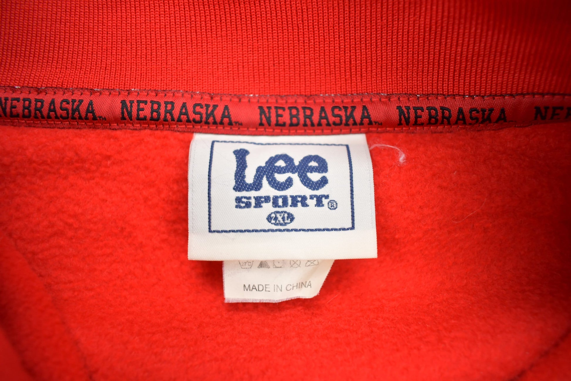 Vintage 1990s NFL Nebraska Huskers Fleece Quarter Zip Up Sweatshirt Men's 2XL from propervintagecanada