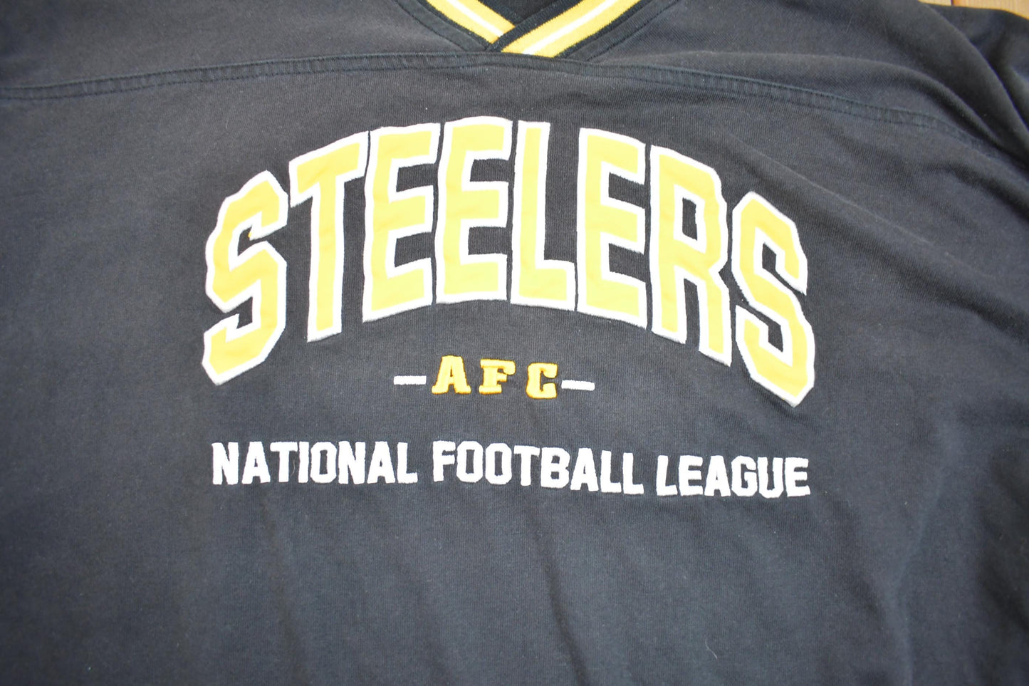Vintage 1990s NFL Pittsburgh Lee Sport Embroidered V-Neck Sweatshirt Men's 2XL from propervintagecanada