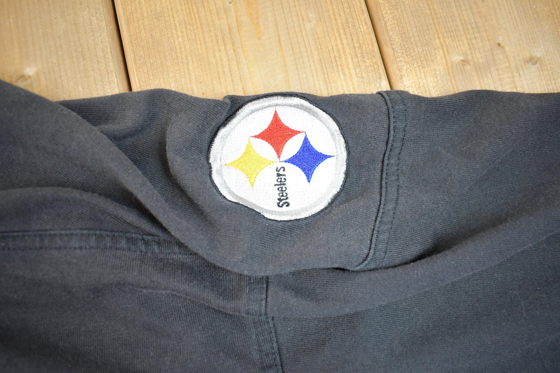 Vintage 1990s NFL Pittsburgh Lee Sport Embroidered V-Neck Sweatshirt Men's 2XL from propervintagecanada