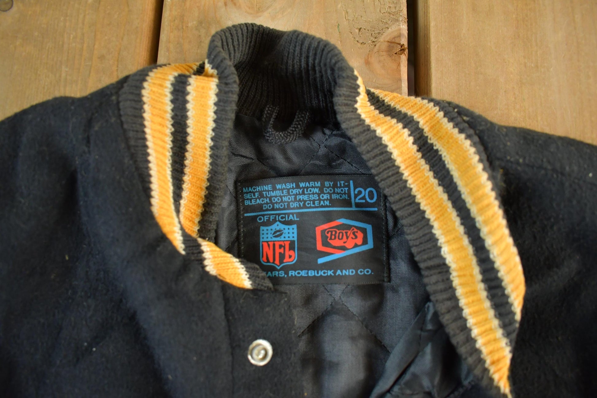 Vintage 1990s NFL Pittsburgh Steelers Wool Embroidered Varsity Jacket Youth Large from propervintagecanada