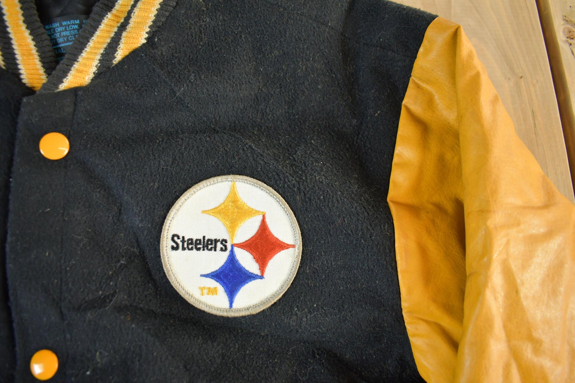 Vintage 1990s NFL Pittsburgh Steelers Wool Embroidered Varsity Jacket Youth Large from propervintagecanada