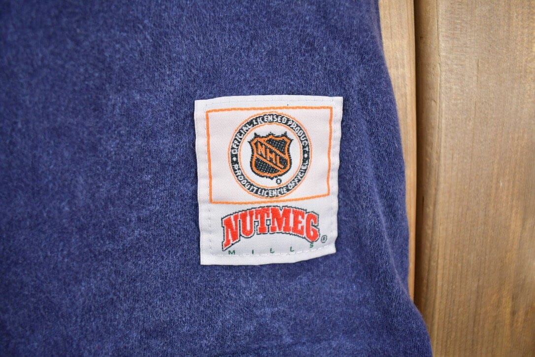 Vintage 1990s NHL Nutmeg Toronto Maple Leafs T-Shirt Made In Canada Men's Large from propervintagecanada