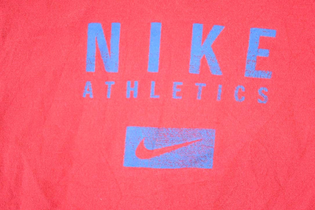 Vintage 1990s Nike Athletics T-Shirt Women's M from propervintagecanada