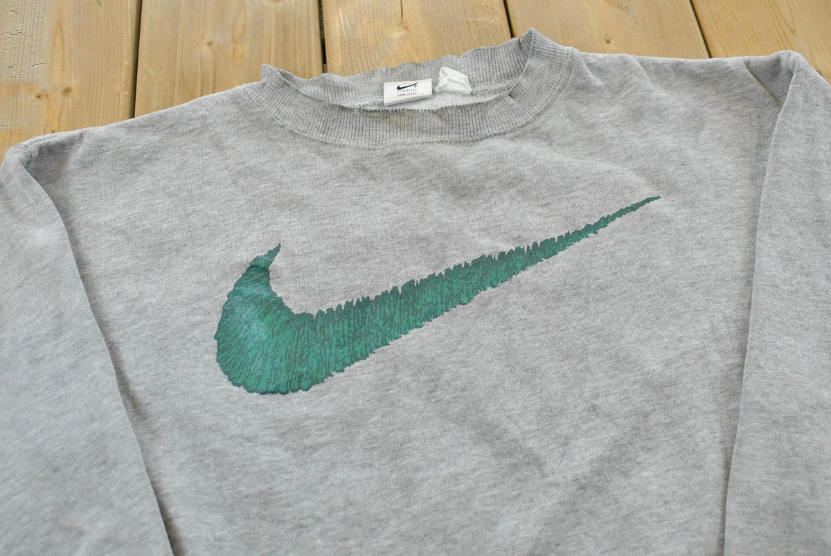 Vintage 1990s Nike Big Swoosh Crewneck Sweatshirt Mens M from propervintagecanada