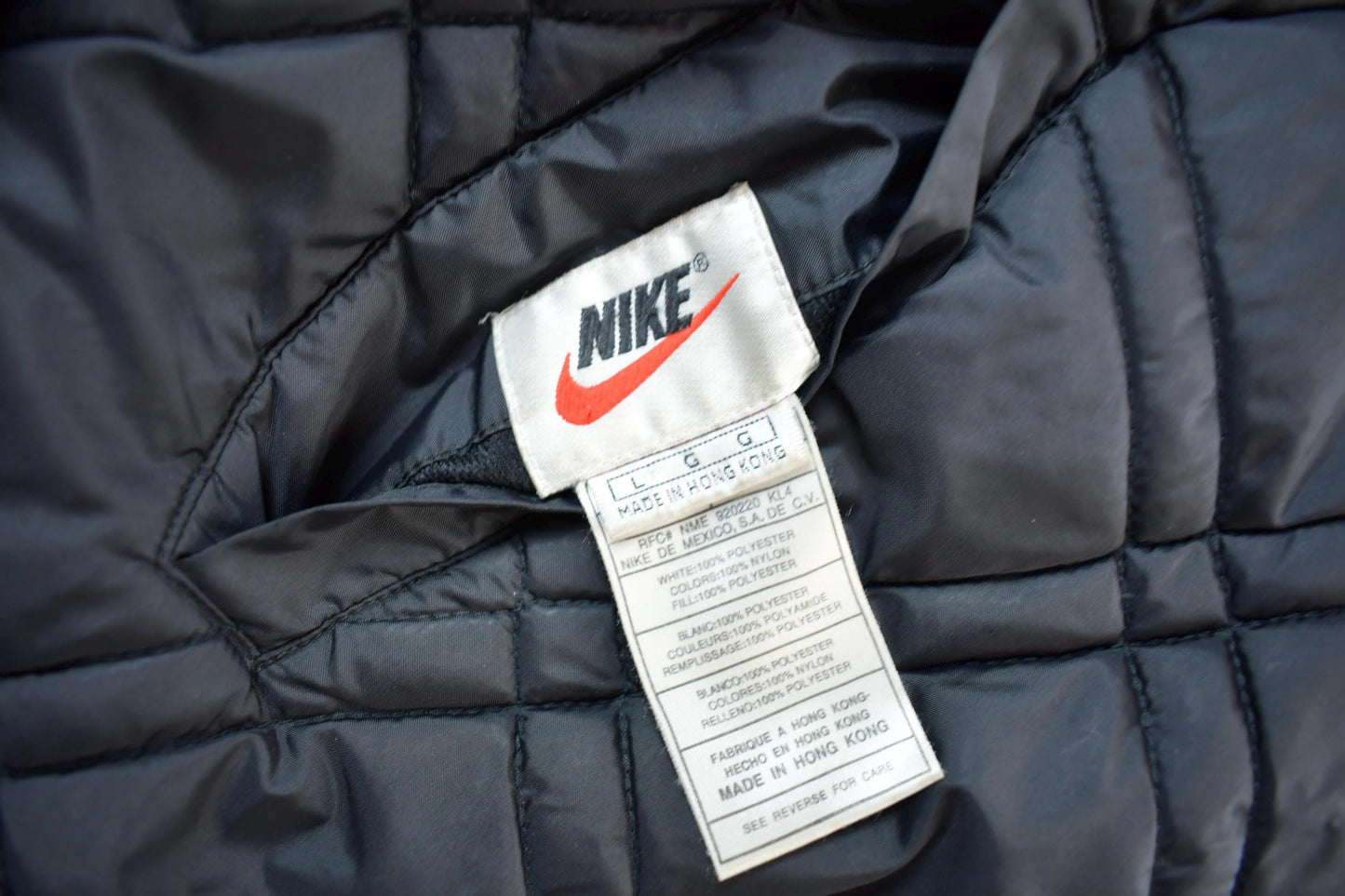 Vintage 1990s Nike Big Swoosh Reversible Jacket Men's Large from propervintagecanada
