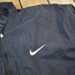Vintage 1990s Nike Big Swoosh Reversible Jacket Men's Large from propervintagecanada