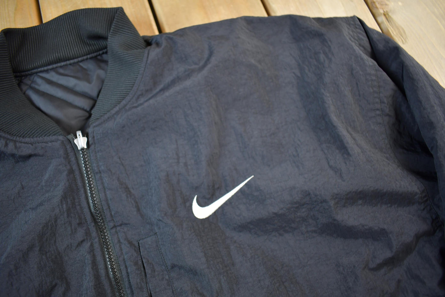 Vintage 1990s Nike Big Swoosh Reversible Jacket Men's Large from propervintagecanada