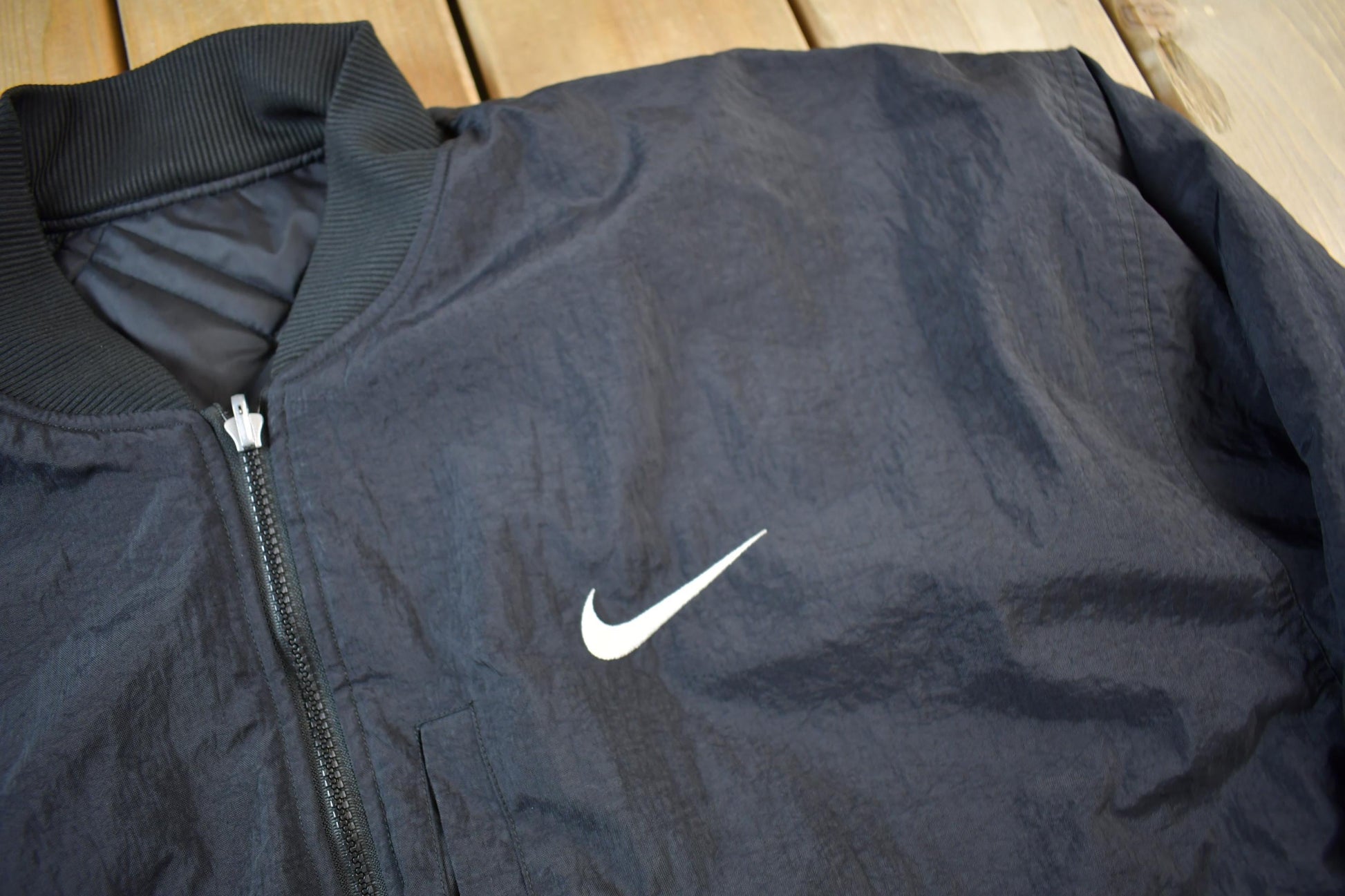 Vintage 1990s Nike Big Swoosh Reversible Jacket Men's Large from propervintagecanada