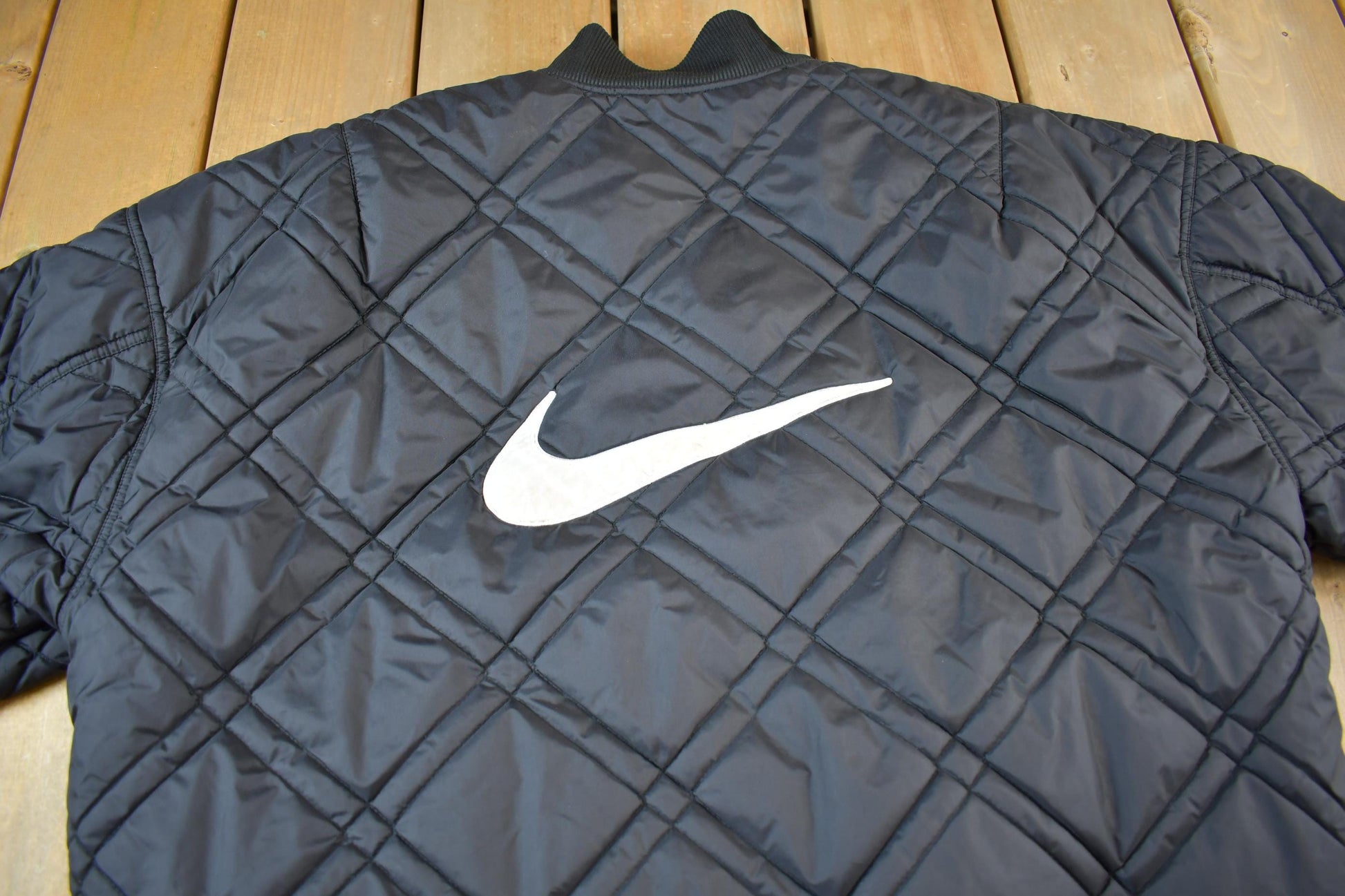 Vintage 1990s Nike Big Swoosh Reversible Jacket Men's Large from propervintagecanada