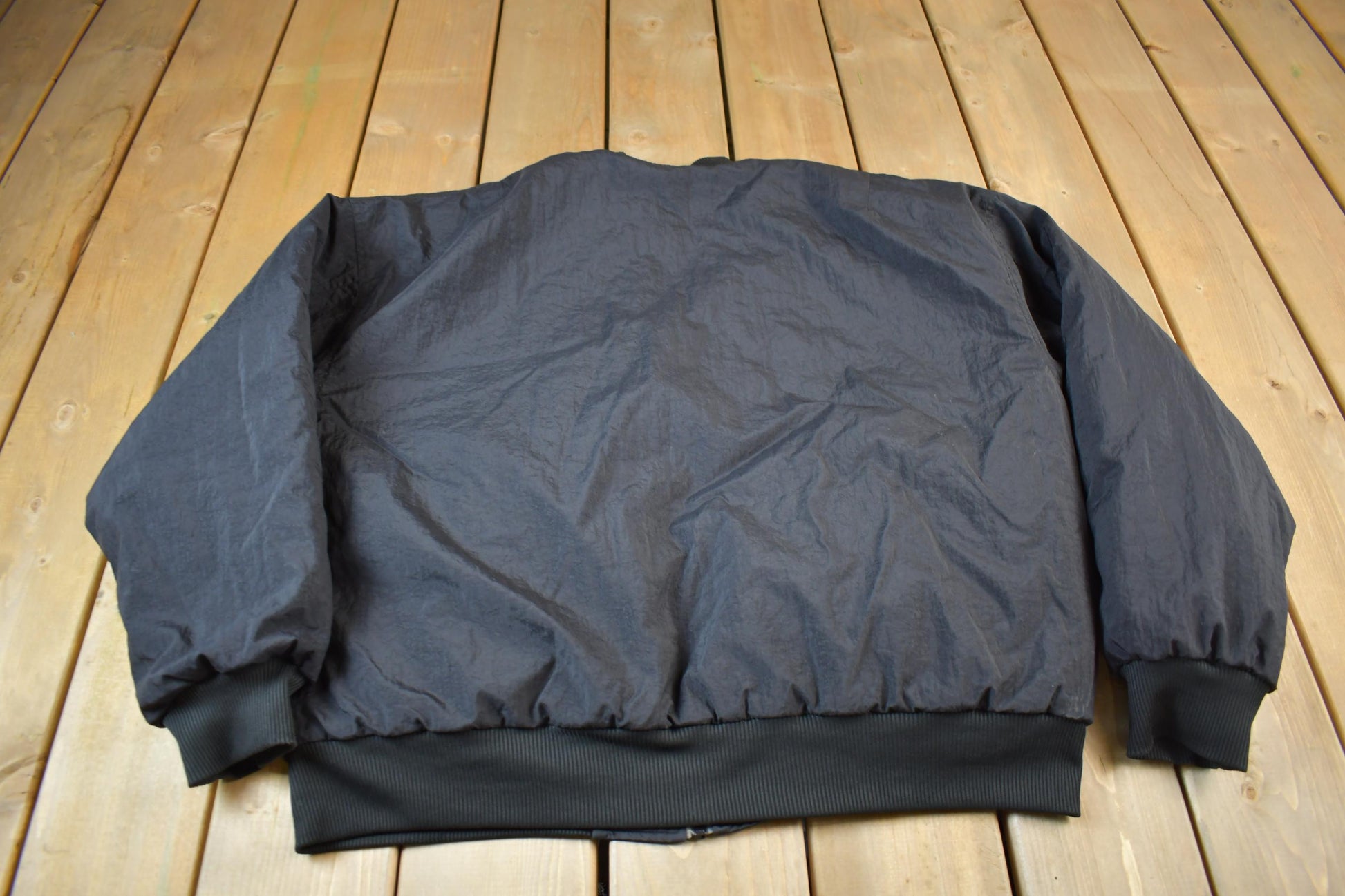 Vintage 1990s Nike Big Swoosh Reversible Jacket Men's Large from propervintagecanada