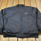 Vintage 1990s Nike Big Swoosh Reversible Jacket Men's Large from propervintagecanada