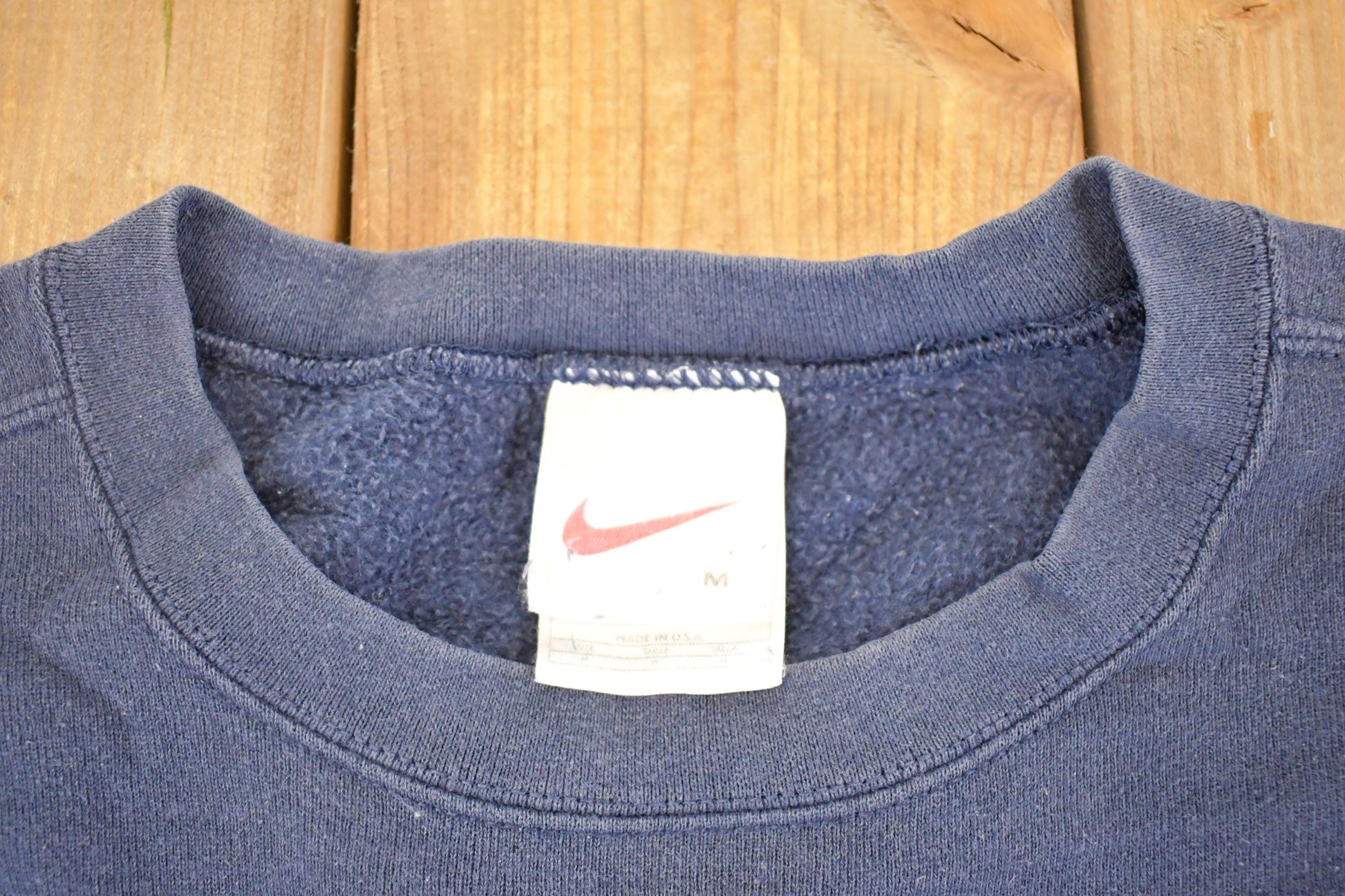Vintage 1990s Nike Department Souvenir Swoosh Crewneck Sweatshirt Men's L from propervintagecanada