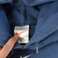 Vintage 1990s Nike Embroidered Mini Middle Swoosh Hoodie Men's L from propervintagecanada