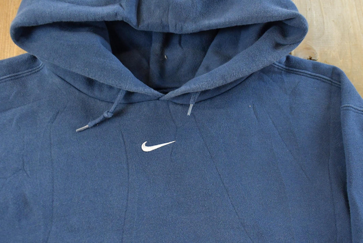 Vintage 1990s Nike Embroidered Mini Middle Swoosh Hoodie Men's L from propervintagecanada