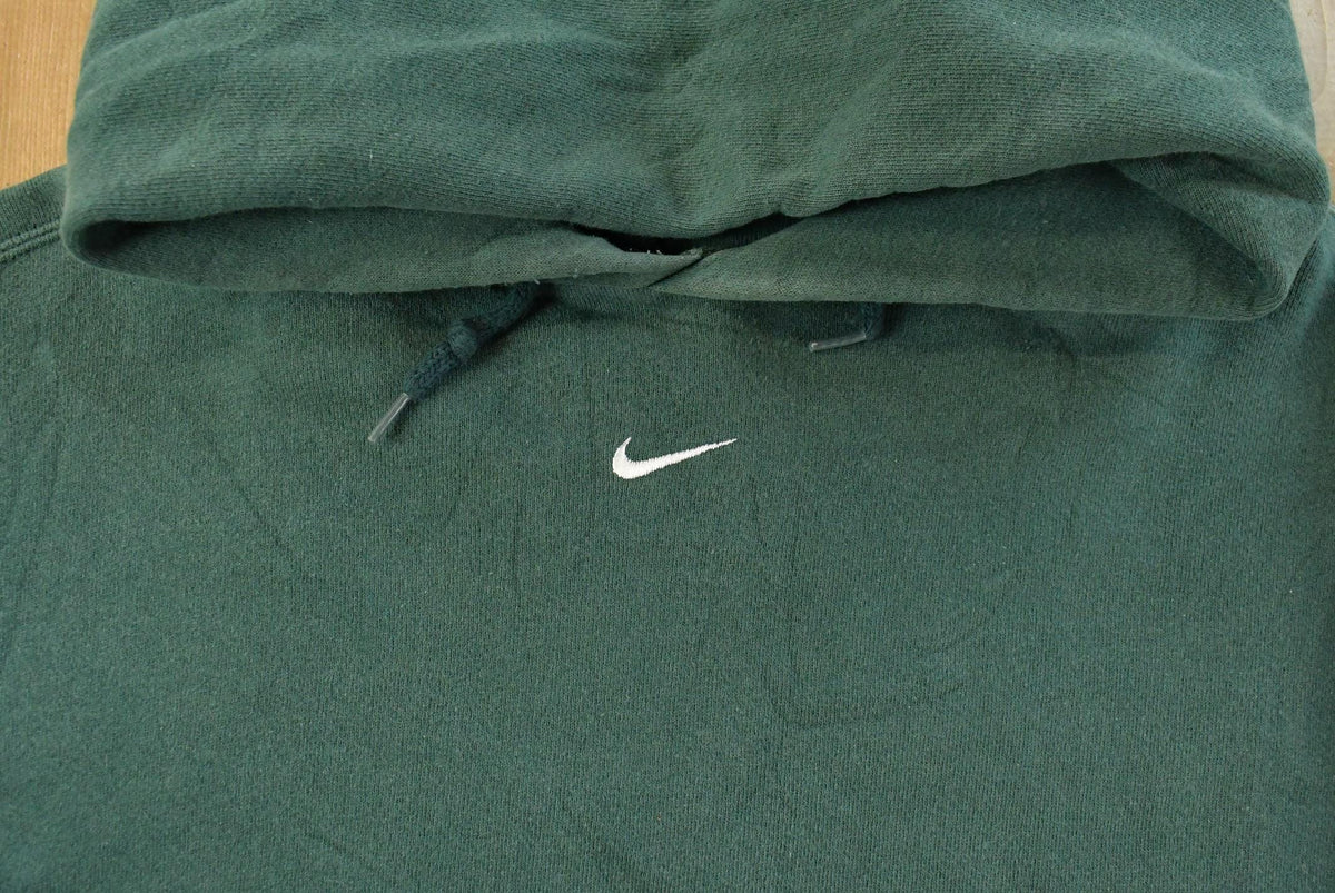 Vintage 1990s Nike Embroidered Mini Middle Swoosh Hoodie Men's XL from propervintagecanada