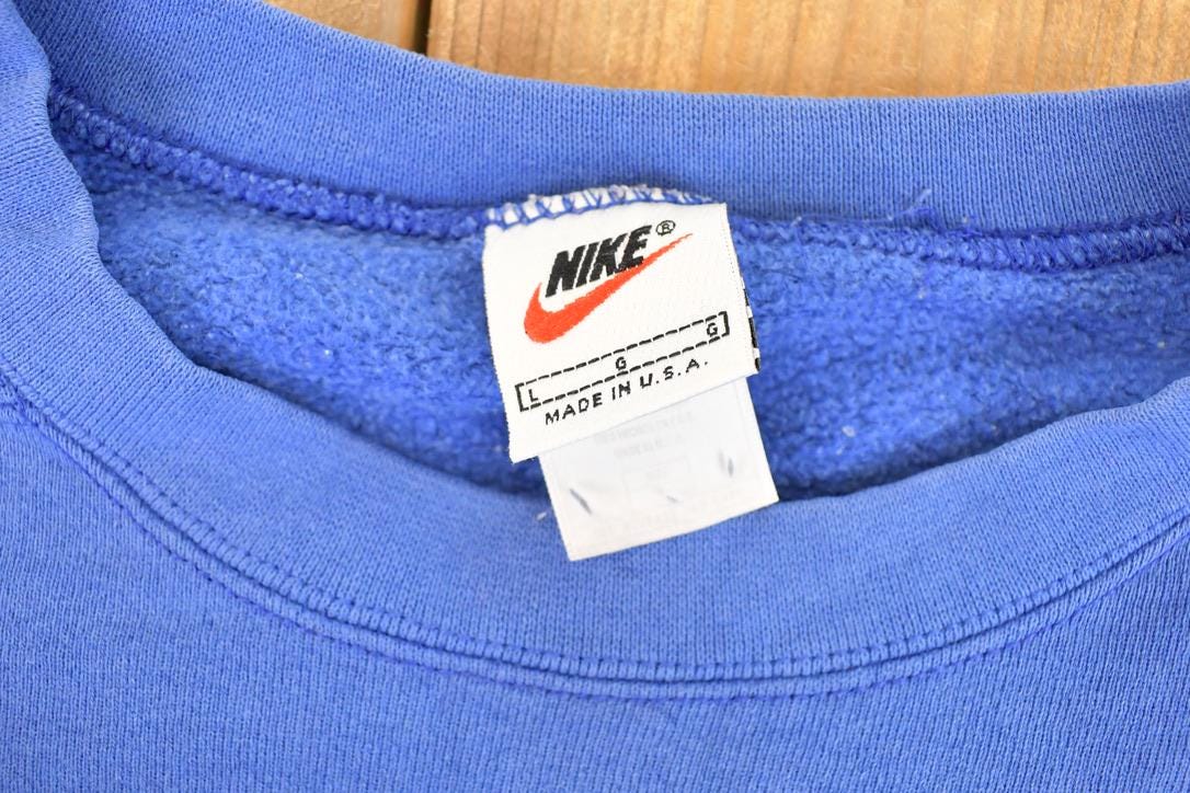 Vintage 1990s Nike Embroidered Mini Swoosh Block Logo Sweatshirt Men's L from propervintagecanada