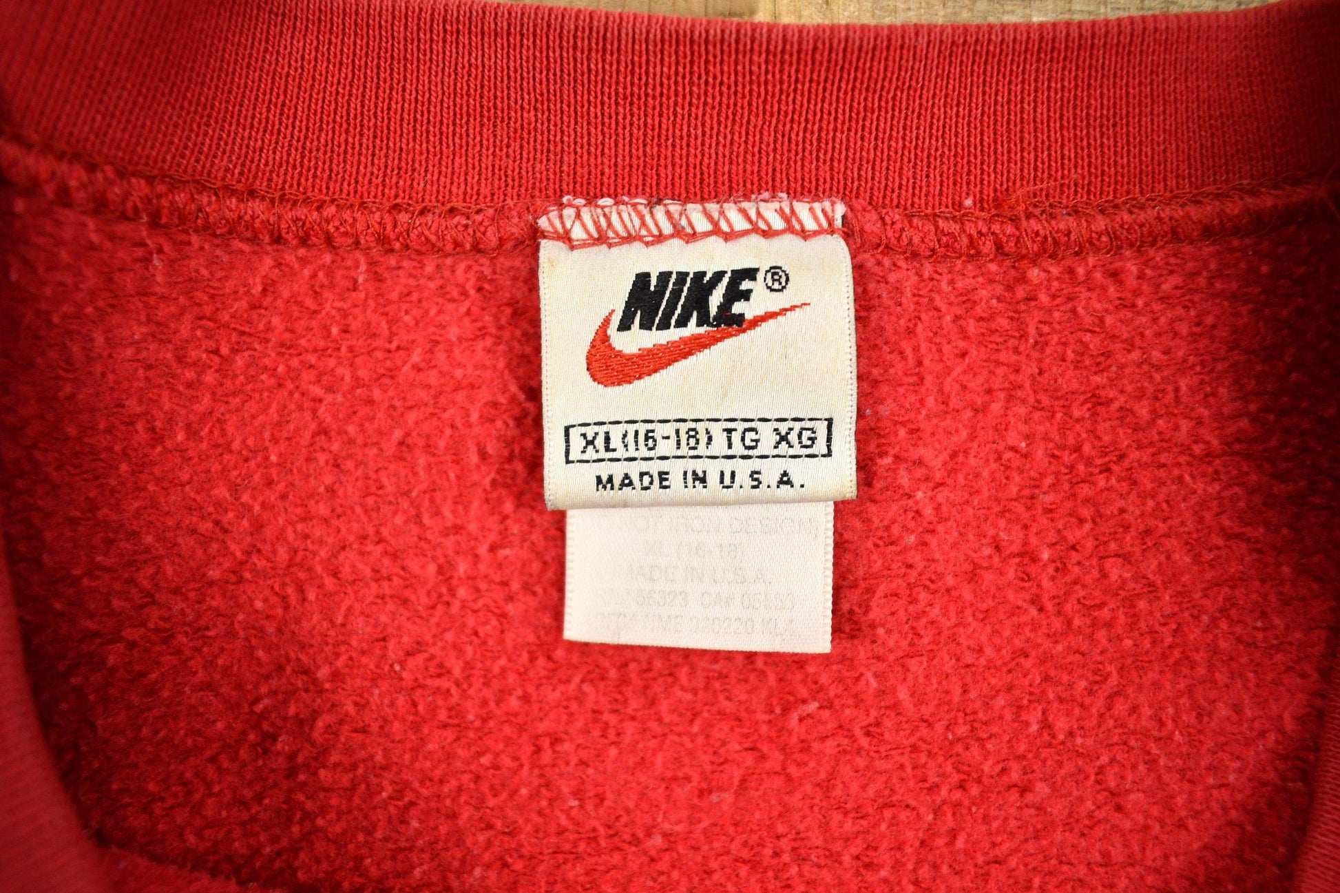 Vintage 1990s Nike Embroidered Mini Swoosh Crewneck Sweatshirt Women's XL from propervintagecanada