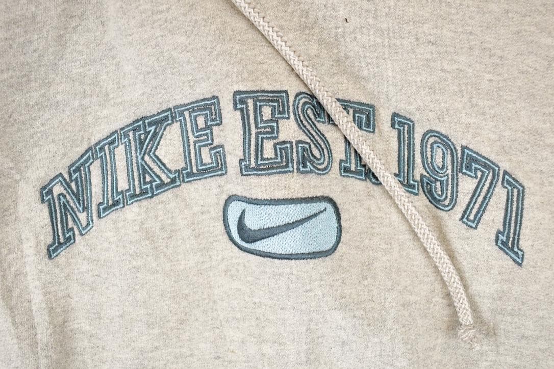 Vintage 1990s Nike Embroidered Mini Swoosh Hoodie Sweatshirt Men's L from propervintagecanada